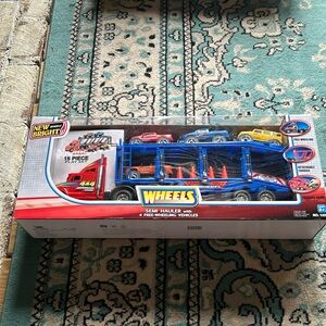 New Bright Wheels Semi Hauler with 4 Free wheeling vehicles